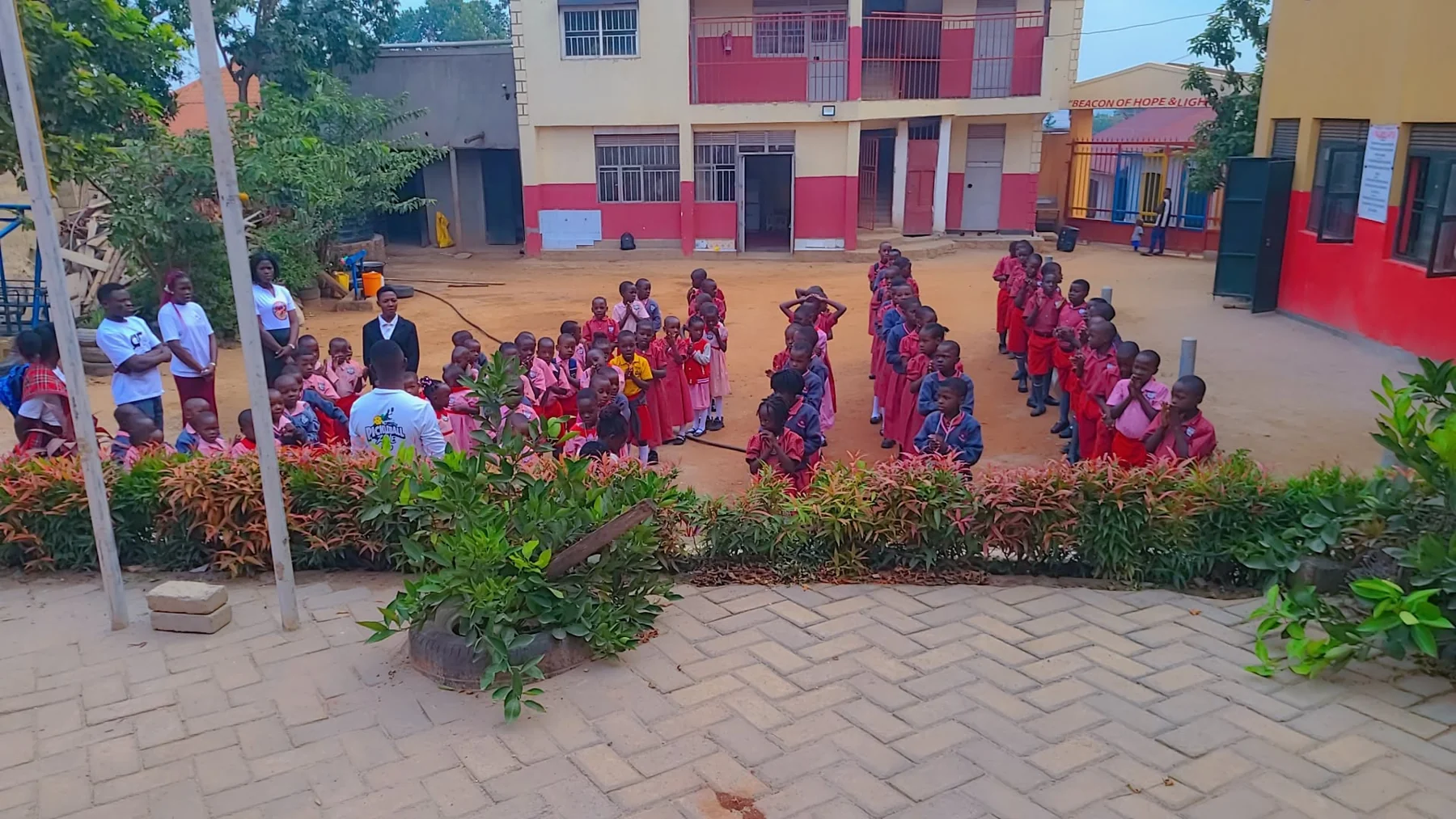 St. Keren pupils and staff gathered in the school courtyard